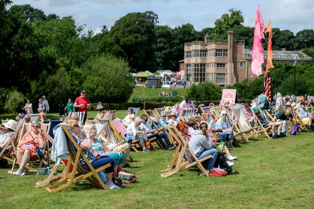 Visitors enjoying themselves at an event in Astley Park